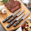 imageFarberware Stamped Triple Rivet Steak Knife Set 4Piece  45Inch HighCarbon Stainless Steel Blades Fine Edge for Easy Slicing Ergonomic Handle for Control ampamp Balance